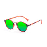Brown vertical strips with green revo lens