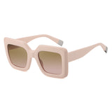 Beige frame with brown lens